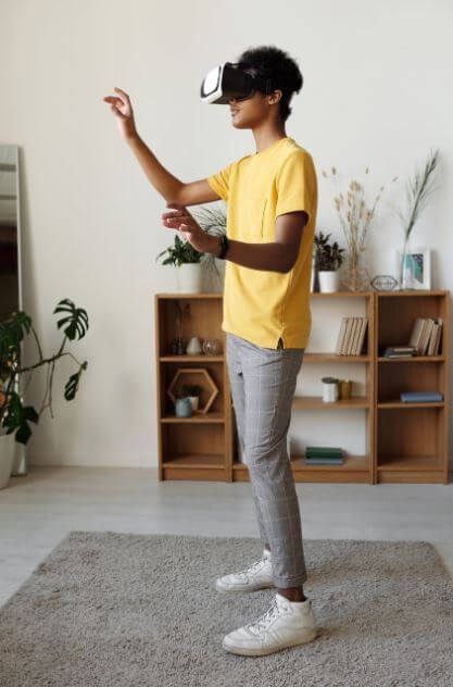 man standing on rug with VR